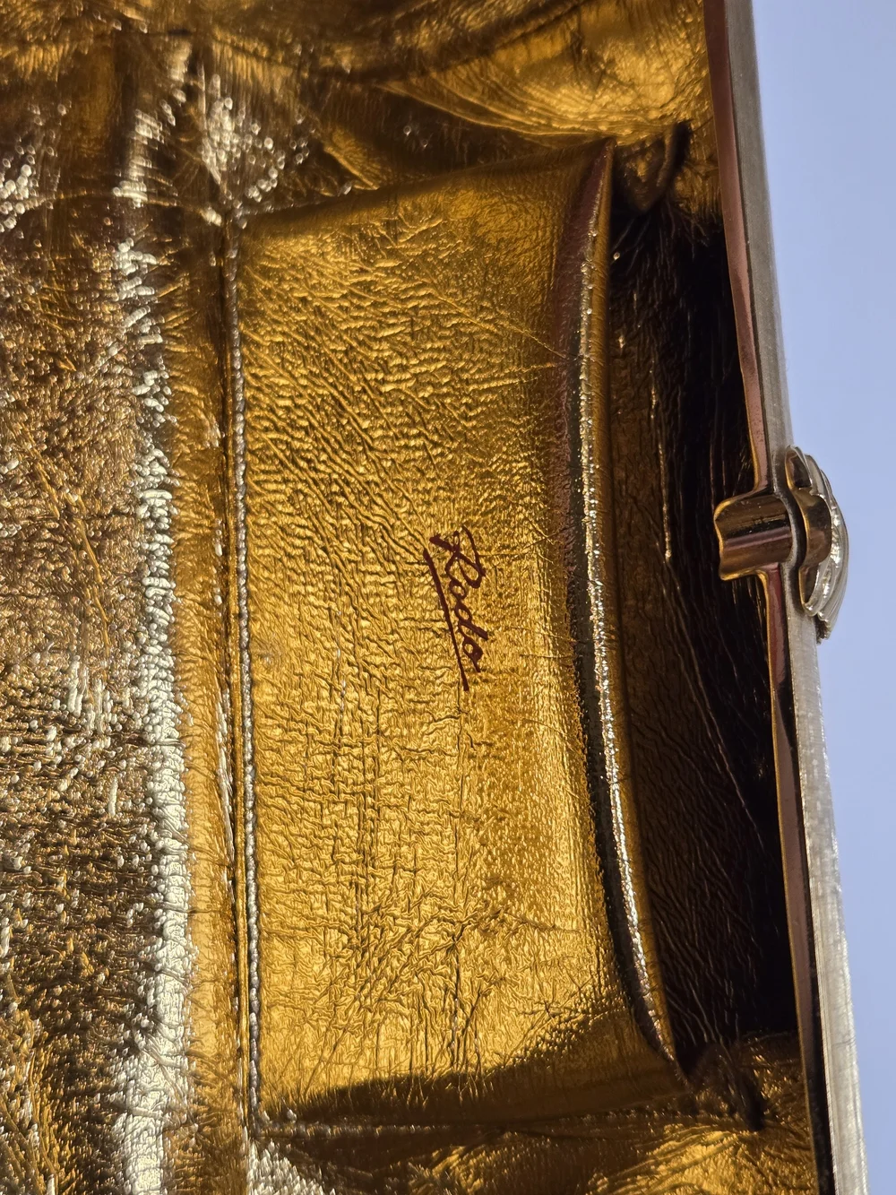 Rodo Gold Metallic Cylinder Clutch with Chain
